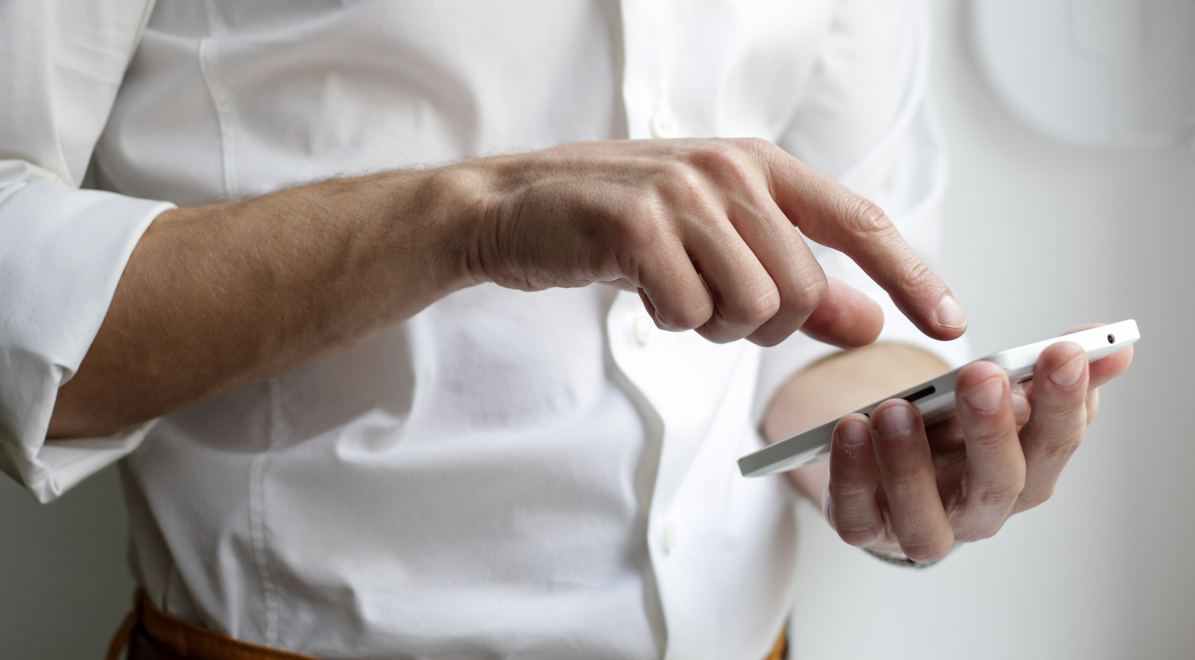 Hands holding a smartphone